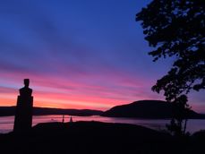 Solnedgangen sett fra Drøbak kirke mot Oscarsborg.