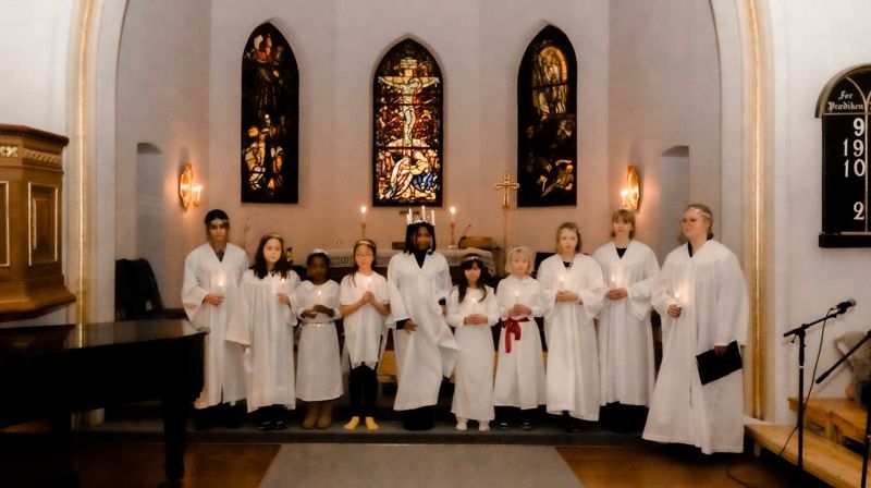 Synstolkning: bilde av Kantoriet fra Luciakonsert. Foto: Bonsak Hammeraas