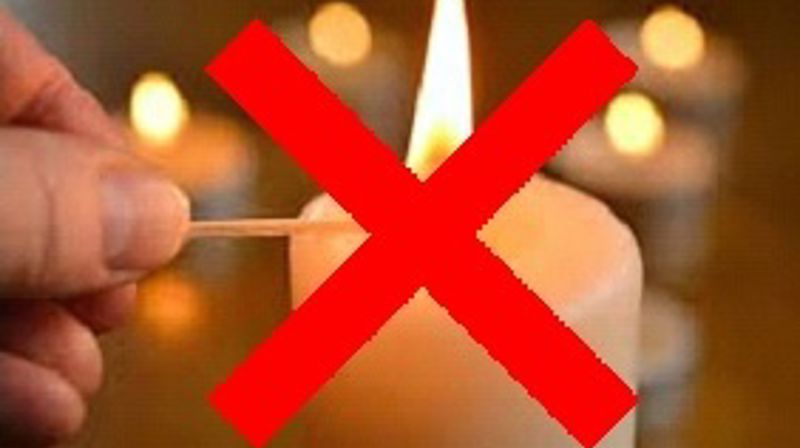 Forbudt med levende lys på kirkegården