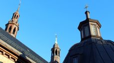 The main tower to the left, the middle tower is at the center of the church. To the right is the tower of the Chapel